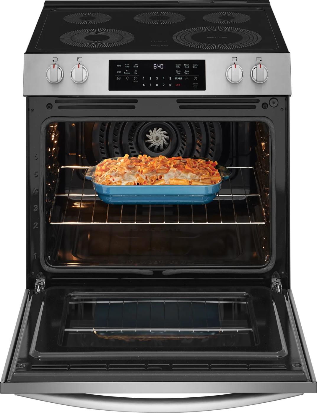 Open front control electric range with total convection oven baking pasta dish in blue ceramic pan in Ranges collection