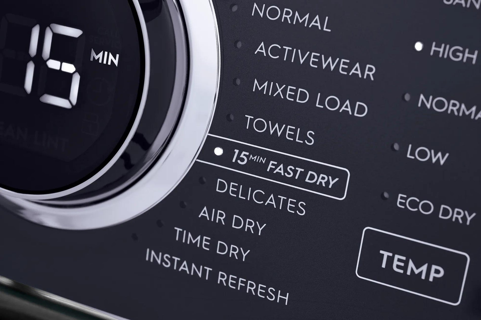 Close-up of black dryer control panel showing 15-minute fast dry setting and various drying cycle options from Dryers collection