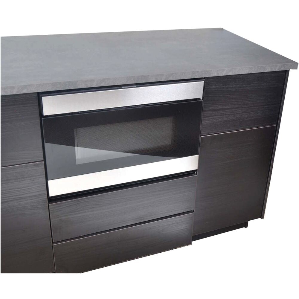 Under-counter dark wood cabinet setup featuring a built-in microwave drawer with stainless steel trim in a modern kitchen setting