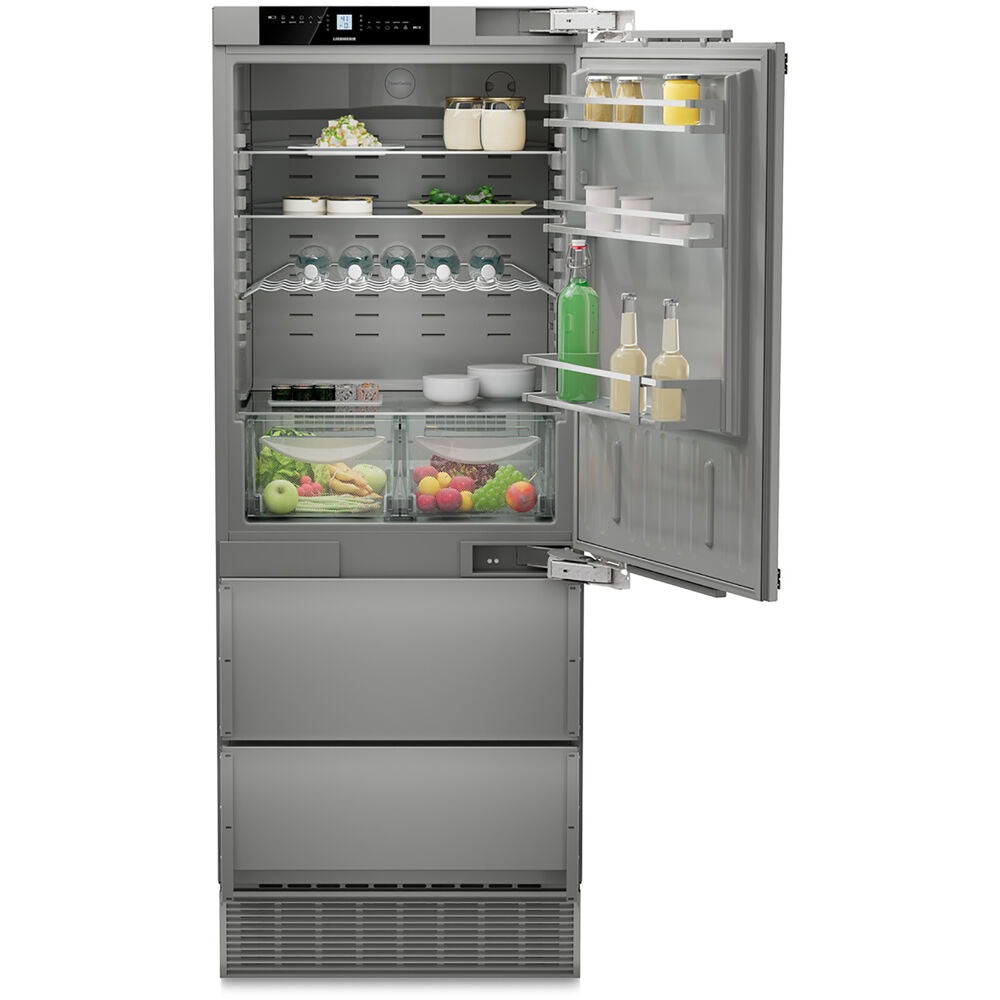 Built-in stainless steel refrigerator/freezer with right hinge, adjustable shelves, clear drawers, and ice maker in kitchen appliances collection