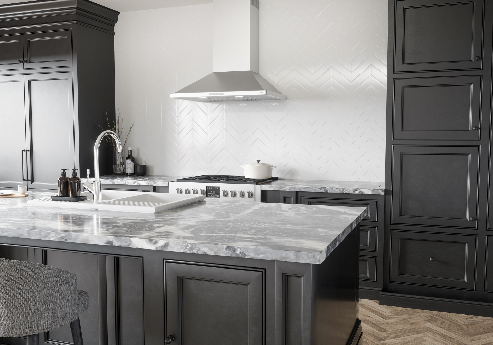 Stainless steel 36-inch chimney hood with LED lighting over modern kitchen stove and marble island countertop