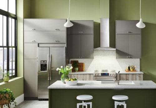 Modern kitchen with stainless steel appliances, gray cabinets, and a pyramid chimney hood for home improvement use