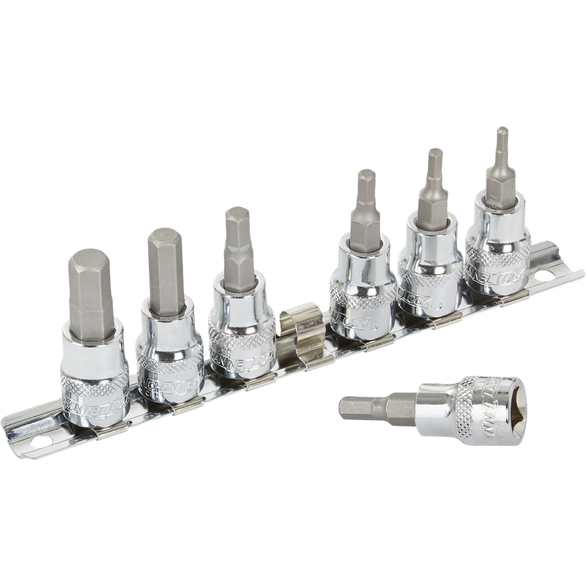 Set of seven hex socket bits with chrome finish organized on a metal rail for home improvement and tools projects