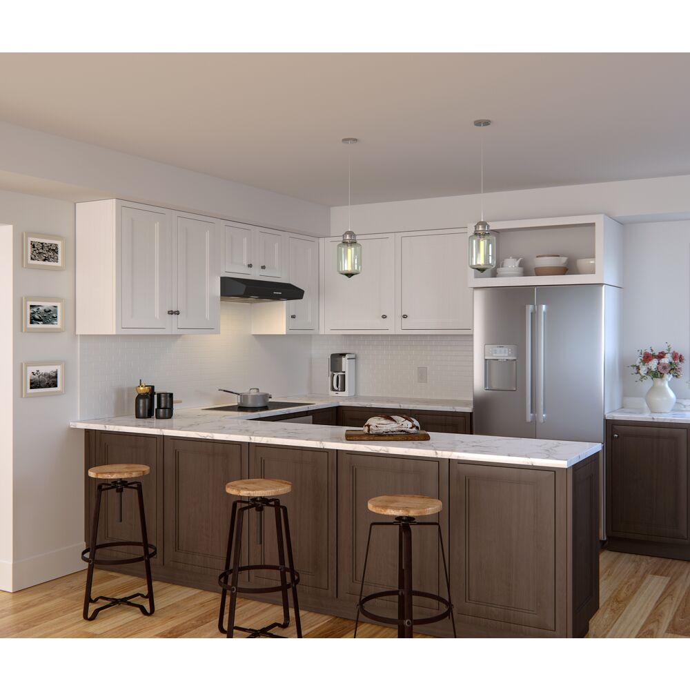 Modern kitchen featuring Breeze II black under cabinet hood with LED lighting above a white stove and island seating area
