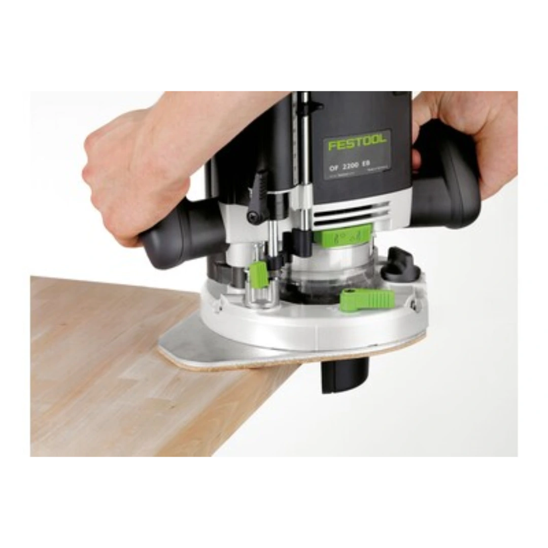 Handheld Festool router with base plate and dust collection, used for precise woodworking and home improvement tasks