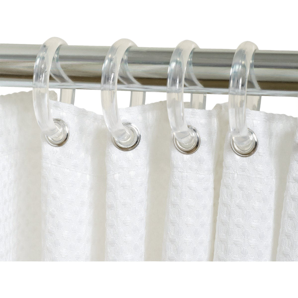 Clear plastic hooks hanging a white textured shower curtain on a metal rod for home improvement use