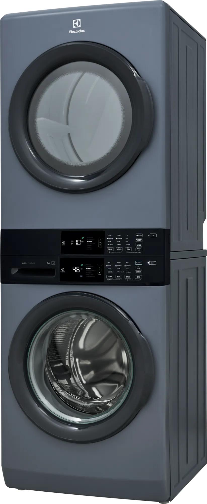 Stacked gray front load washer and electric dryer with digital control panels and see-through doors, part of appliance laundry centers at Hartville Hardware.