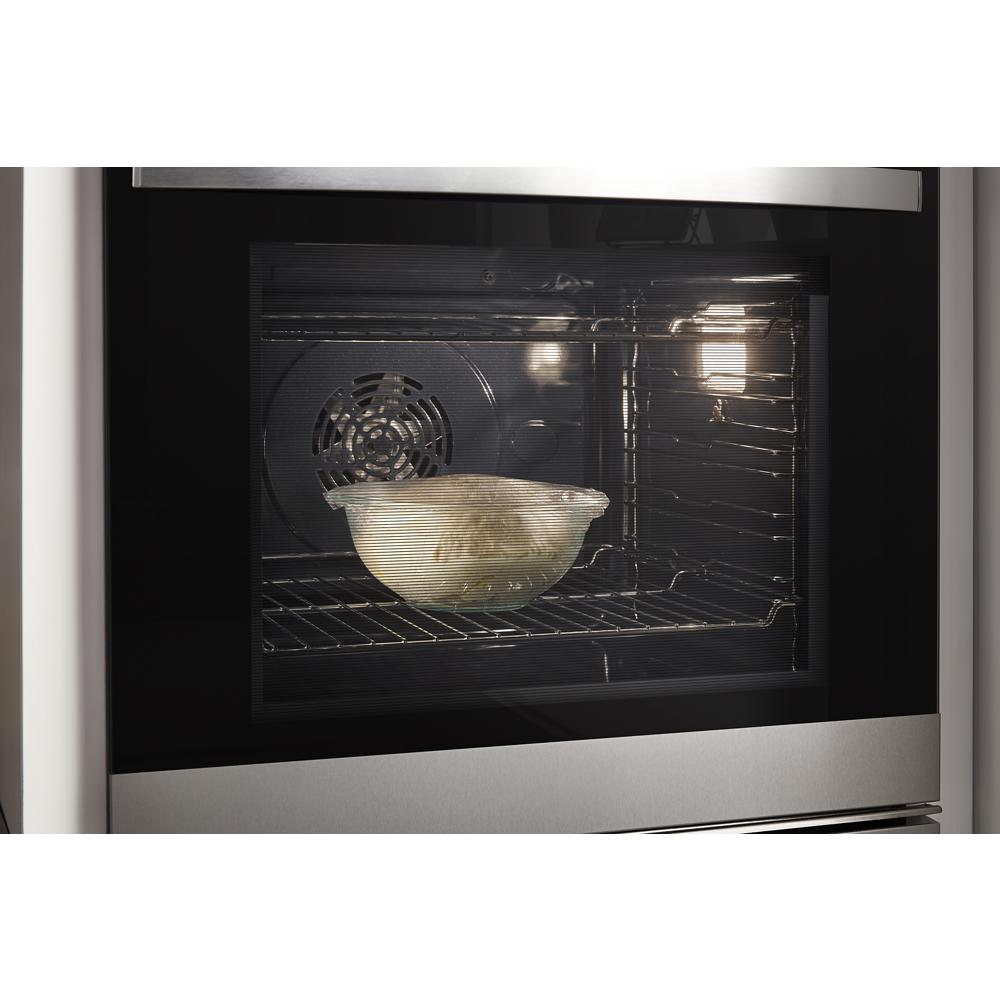 Glass bowl with dough rising inside a stainless steel double wall oven from Kitchen & Kitchenware appliances collection