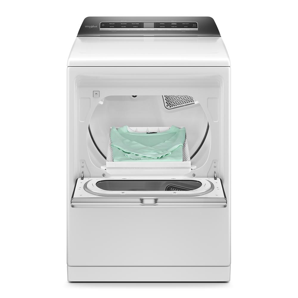 White top load electric dryer with open door showing folded clothes inside from Dryers collection