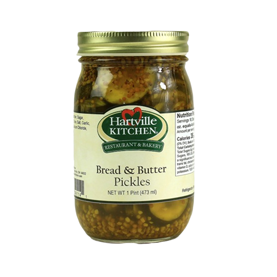 Glass jar of Hartville Kitchen bread and butter pickles with gold lid in preserved goods and food collections