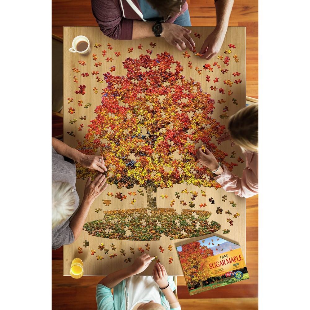 Group assembling a 1000-piece shaped puzzle of a colorful sugar maple tree in Toys & Games collection under $50