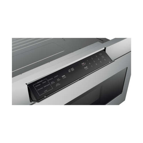 Close-up of digital control panel with touch buttons and LED display on built-in microwave drawer in kitchen appliances collection