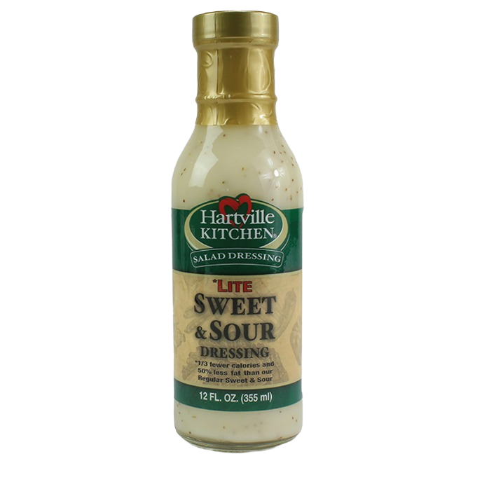 Bottle of Hartville Kitchen Lite Sweet and Sour dressing with gold cap and green label for salad use