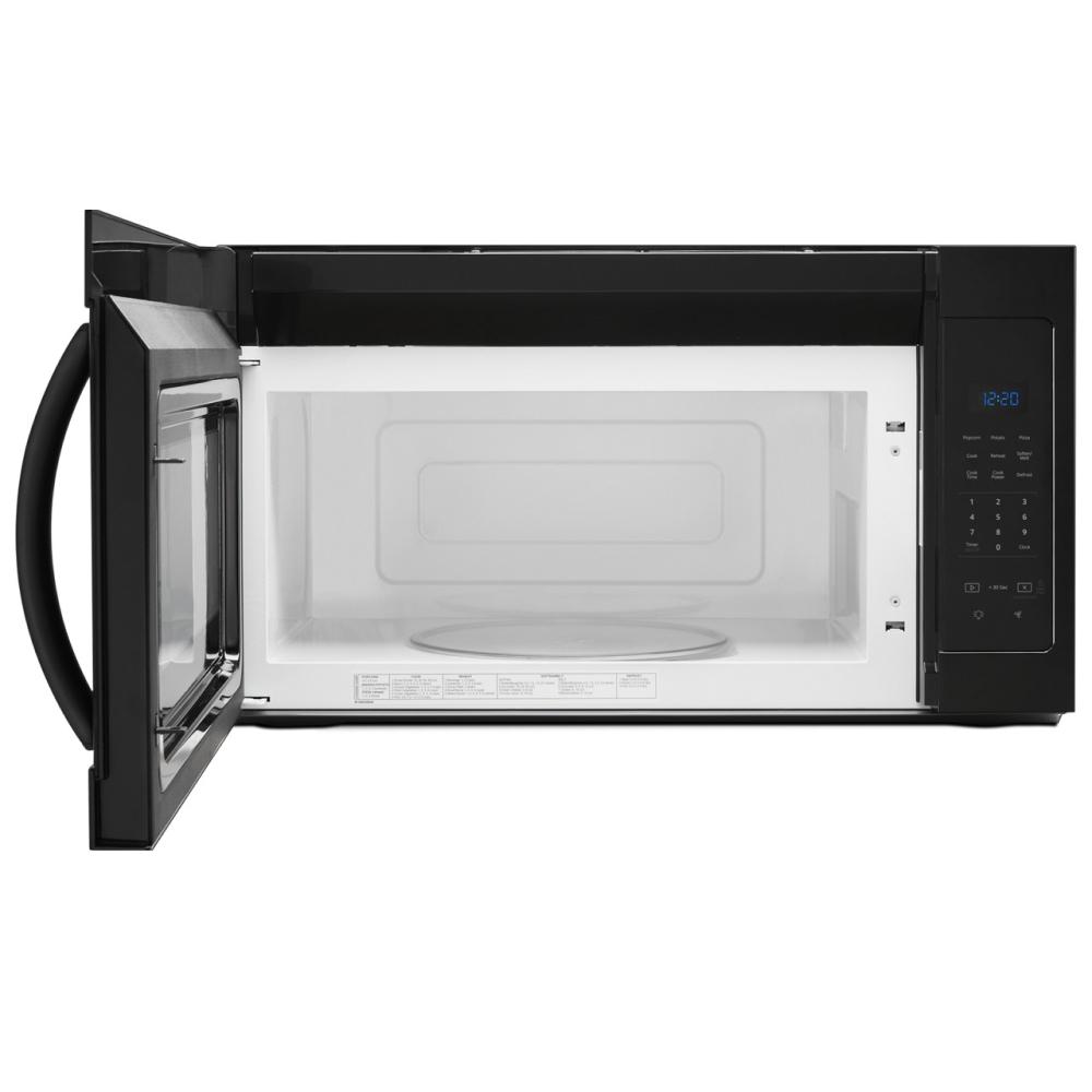 Black over-the-range microwave with electronic touch controls and open door showing glass turntable inside
