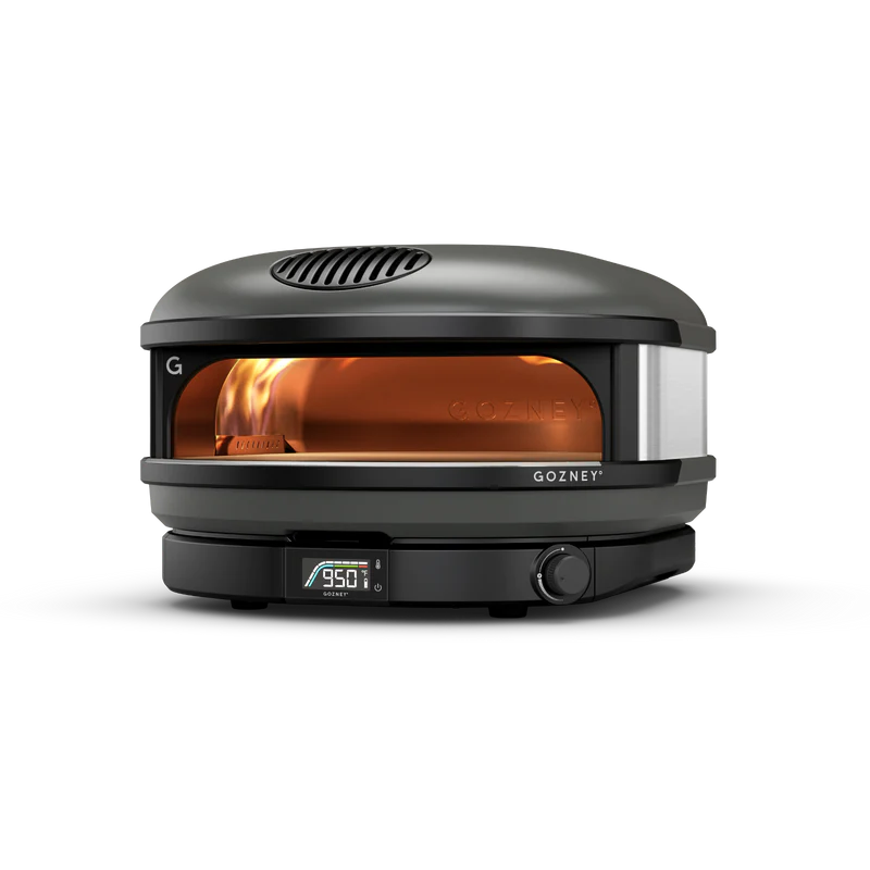 Black compact pizza oven with digital controls and visible flame, designed for outdoor grilling and cooking enthusiasts