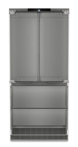 Built-in stainless steel French door refrigerator with integrated freezer drawers in modern kitchen appliances collection