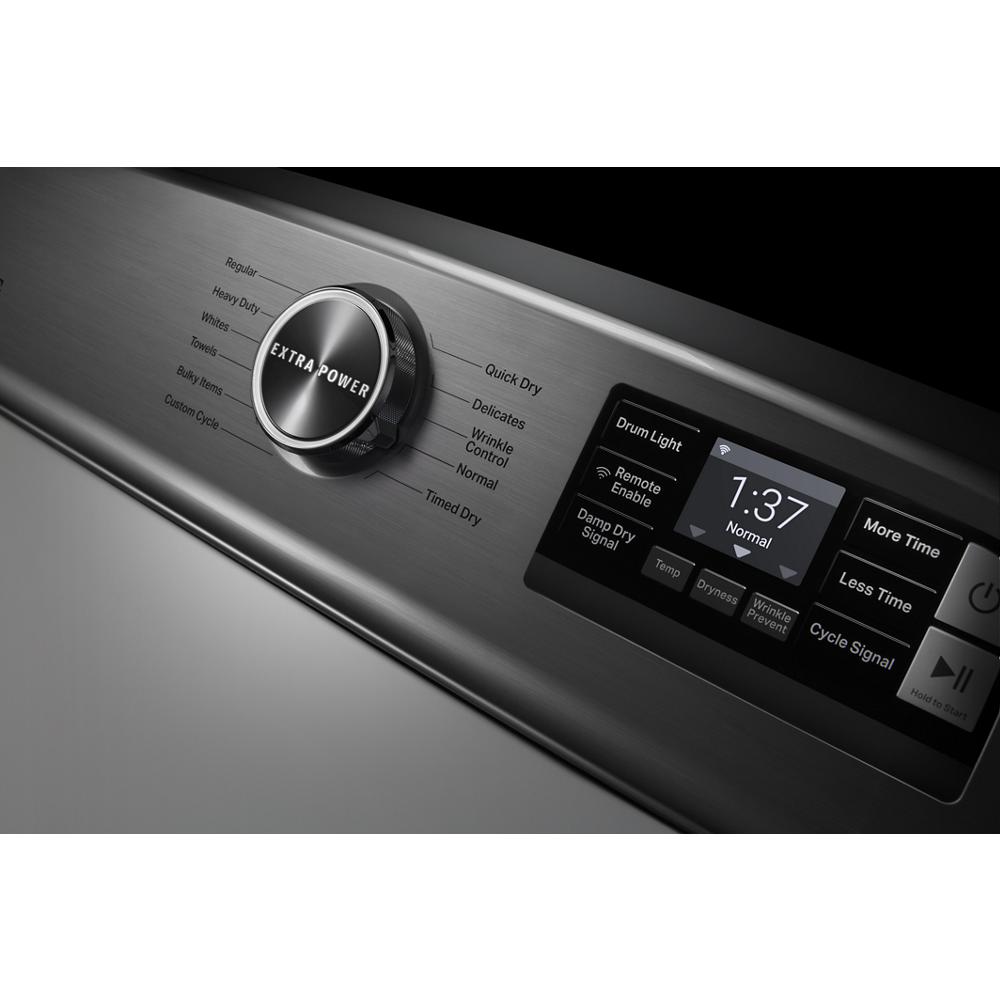 Close-up of stainless steel dryer control panel featuring extra power button and digital display in dryers collection