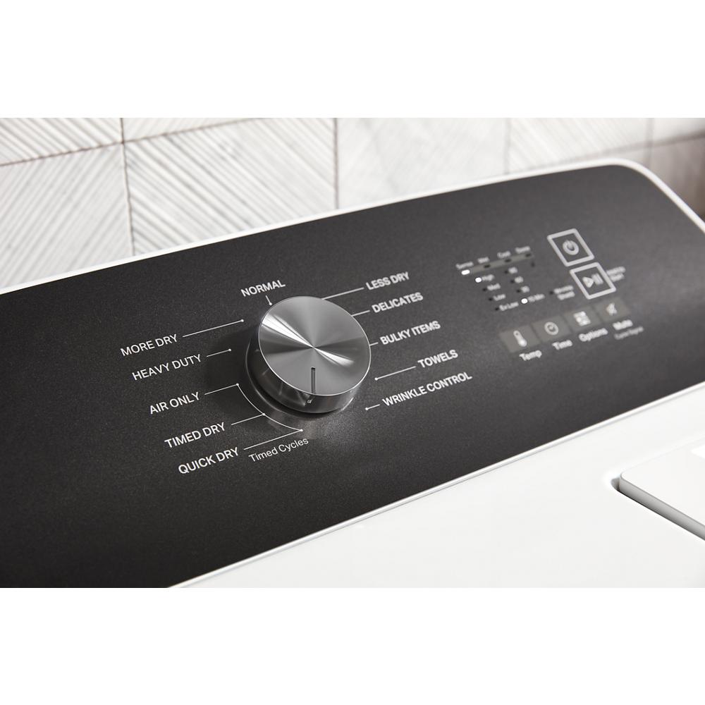 Close-up of black control panel with dial and digital buttons on a modern moisture sensing dryer in appliances collection