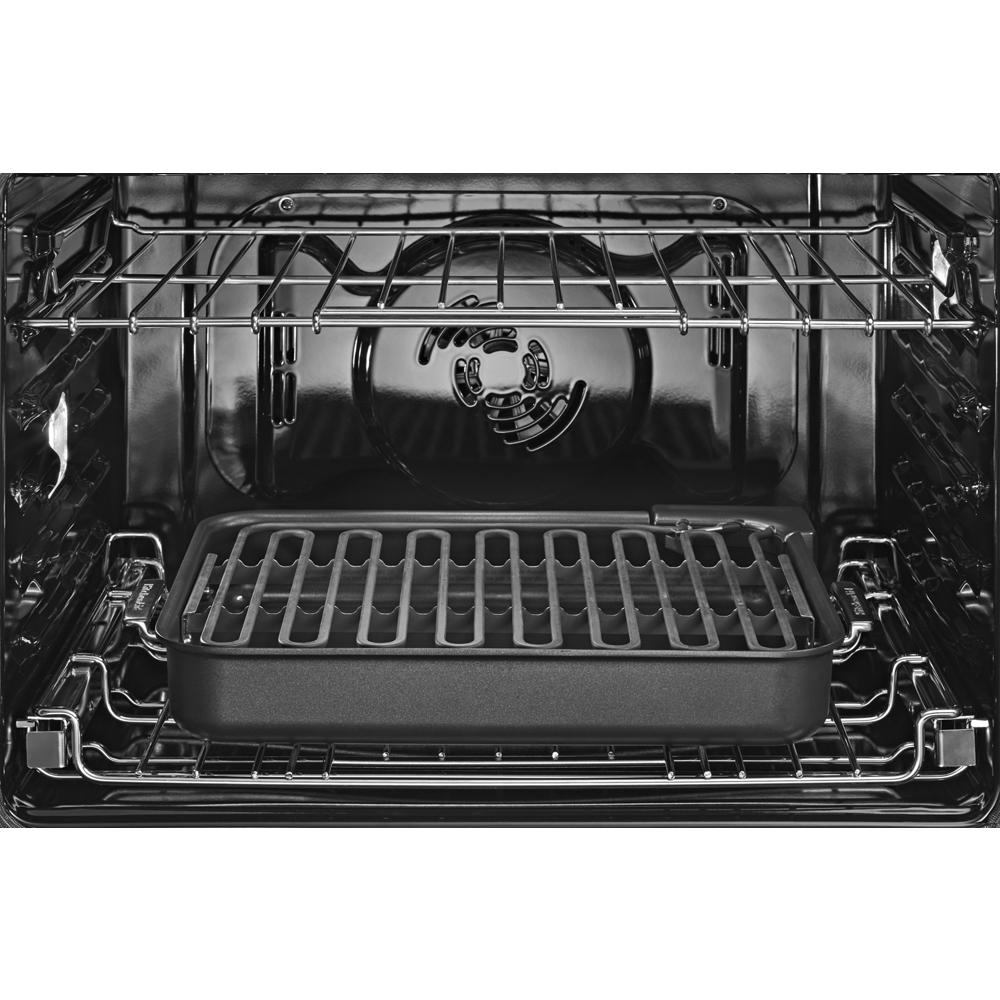 Interior view of KitchenAid double wall oven with metal racks and removable grill pan in Appliances collection