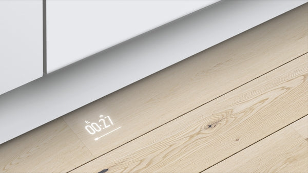Close-up of digital dishwasher timer displayed on kitchen floor from Bosch appliances in Kitchen & Kitchenware collection