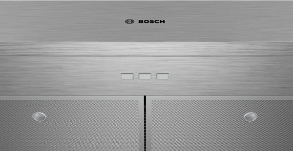 Stainless steel undercabinet range hood with mesh filters, push button controls, and Bosch logo in kitchen appliances collection