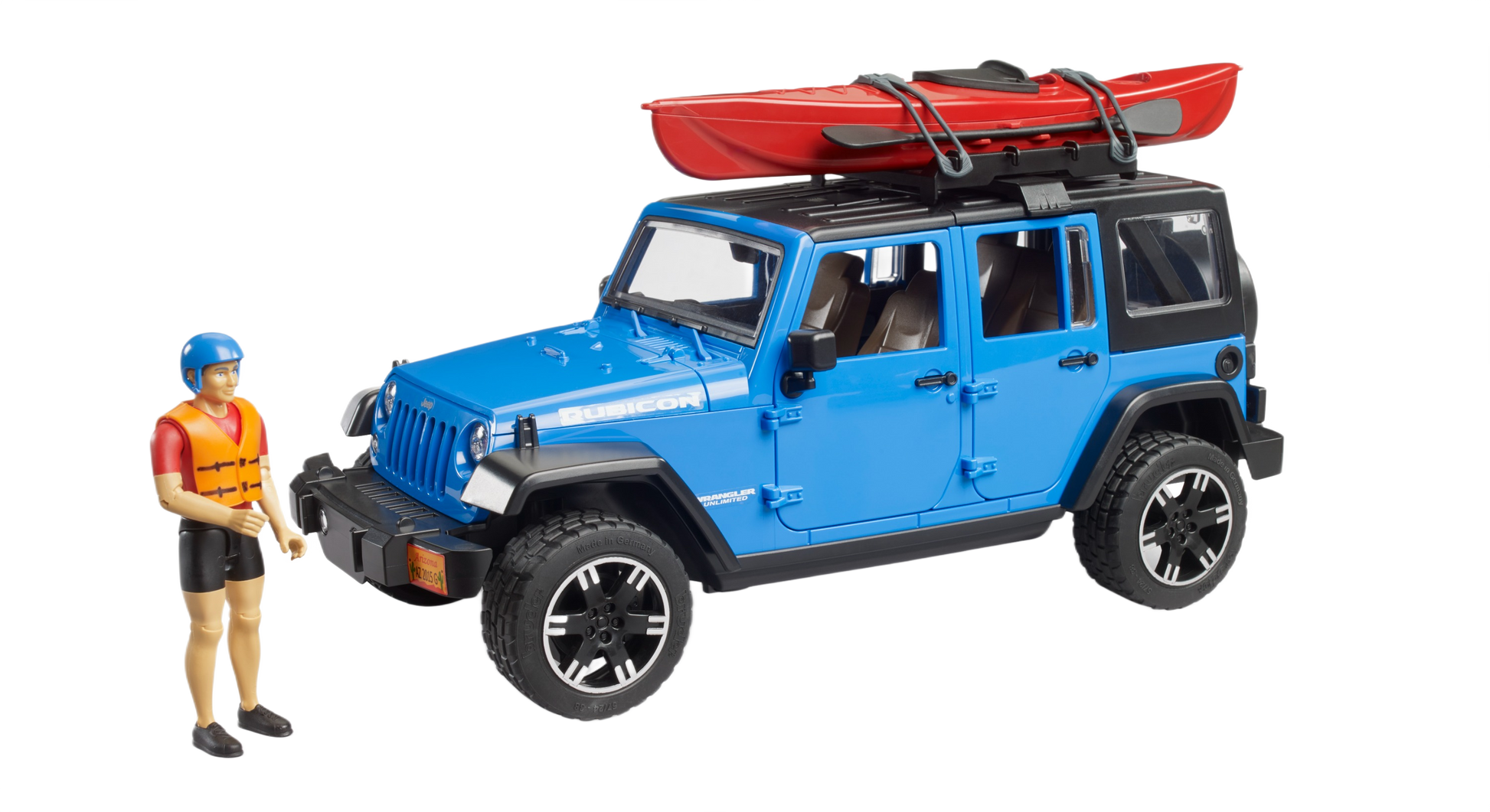 Blue Bruder Jeep Wrangler Rubicon toy with red kayak on roof and action figure wearing helmet and life vest