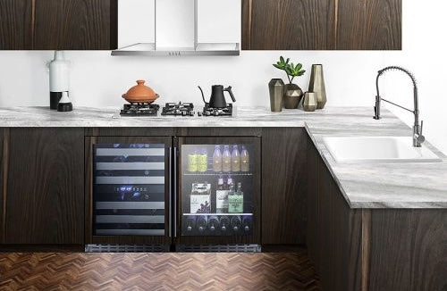 Dual built-in beverage coolers with dark tinted glass doors and visible LED displays in modern kitchen cabinetry