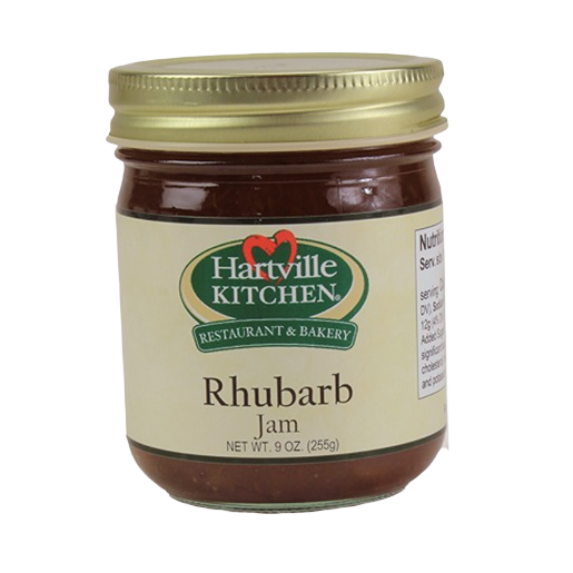 Glass jar of Hartville Kitchen rhubarb jam with gold lid in jams and jellies food and beverage collections