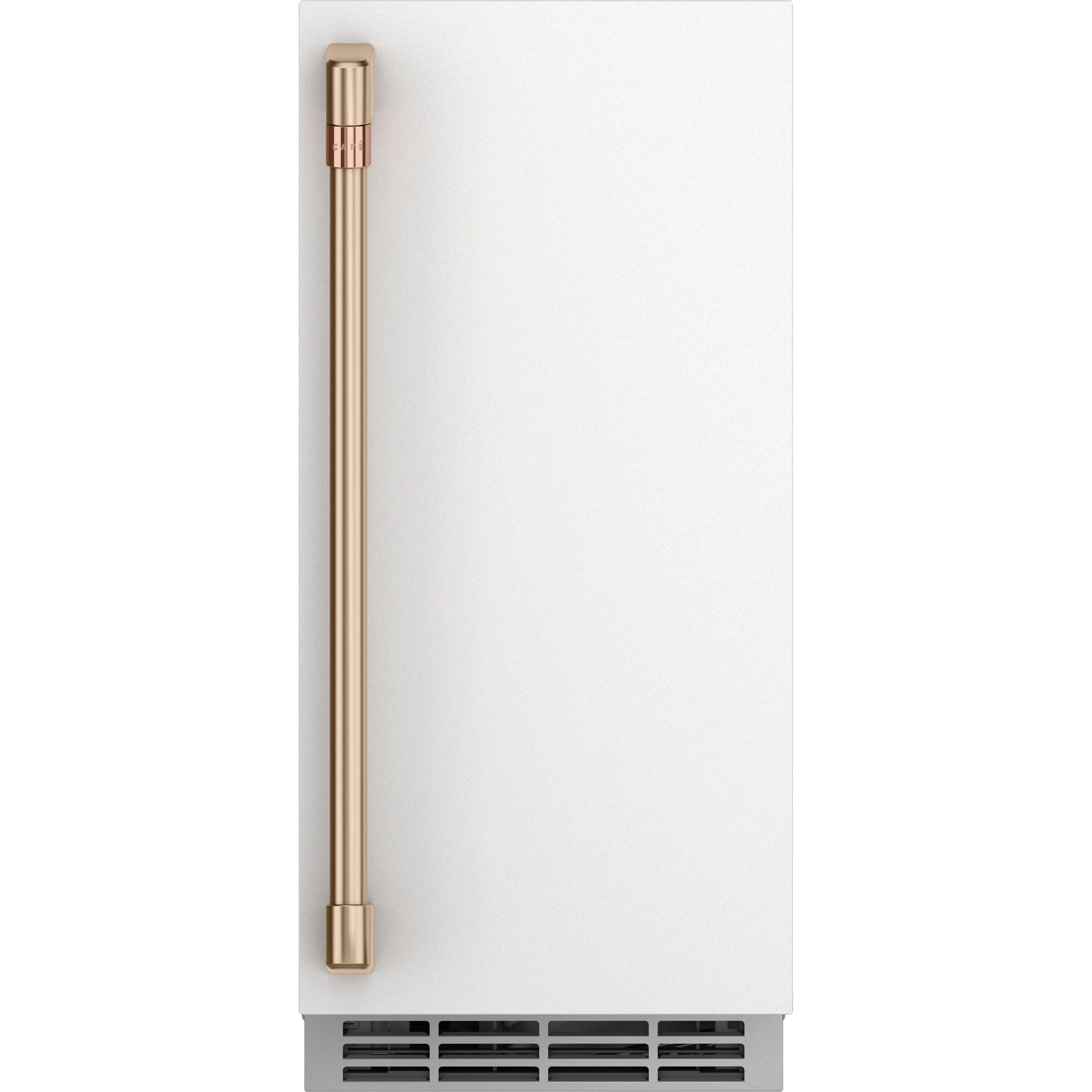 White ice maker door with brushed gold vertical handle and bottom ventilation grille from appliances collection