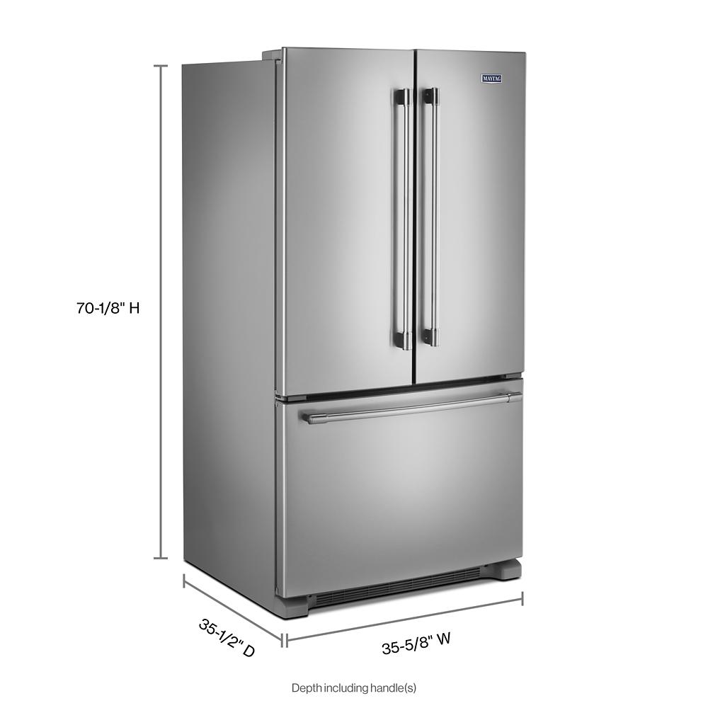 Stainless steel french door refrigerator with bottom freezer and vertical handles in kitchen and appliances collections
