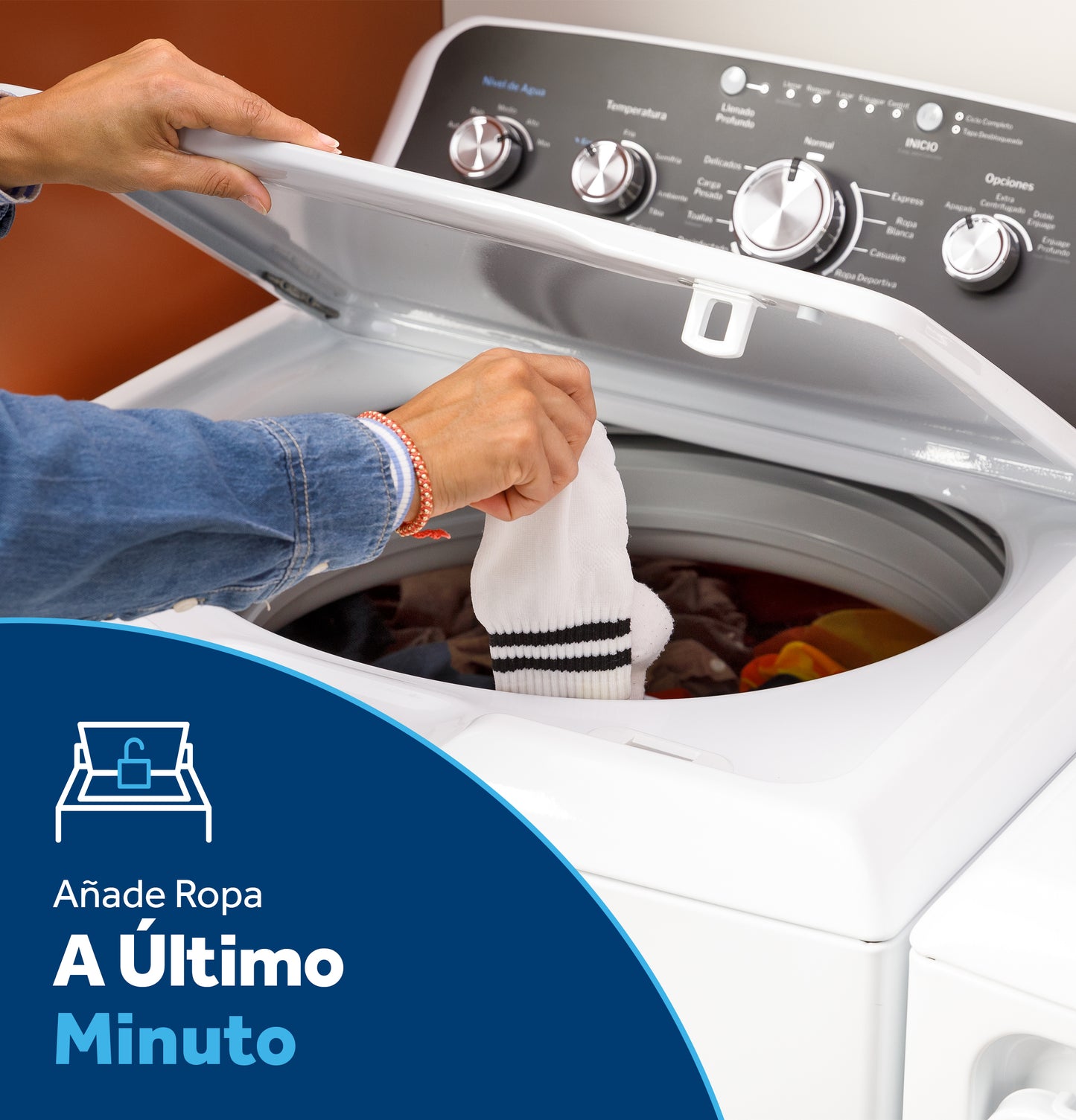 Hands adding a white sock into a white top load washer from the washers and dryers collection