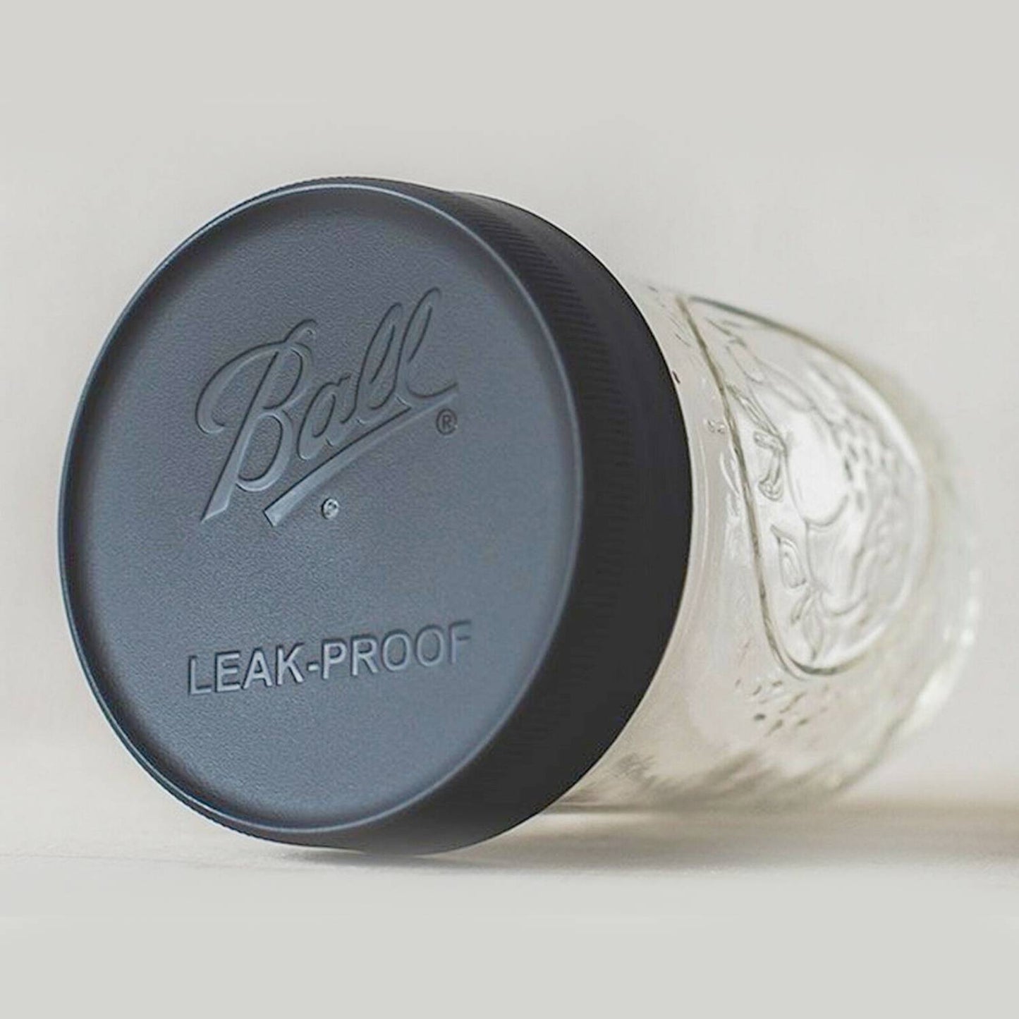 Gray leak-proof lid on embossed glass jar for kitchenware and food storage in kitchen gadgets collection