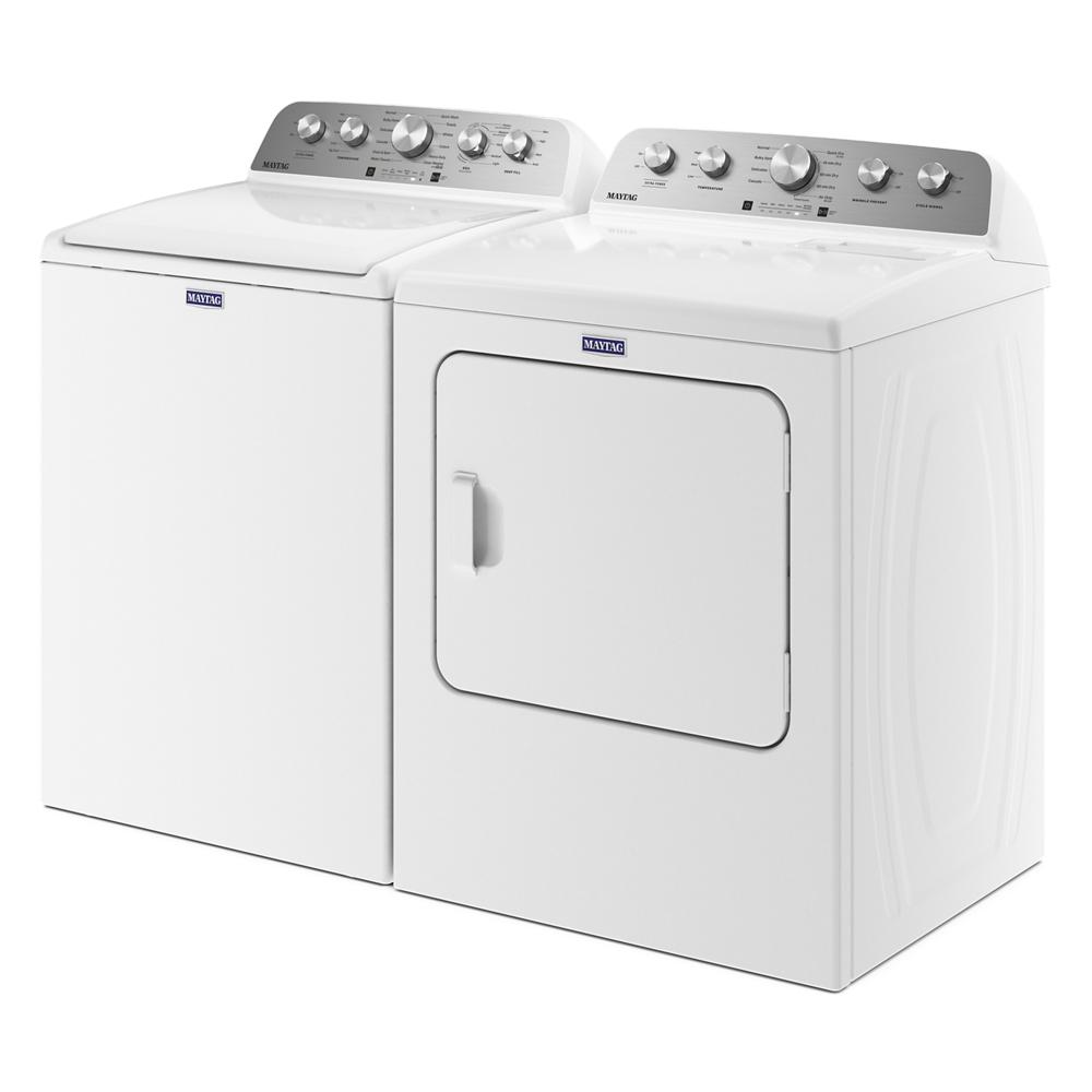 Pair of white Maytag laundry appliances with top load washer and front load electric dryer in home tools collection