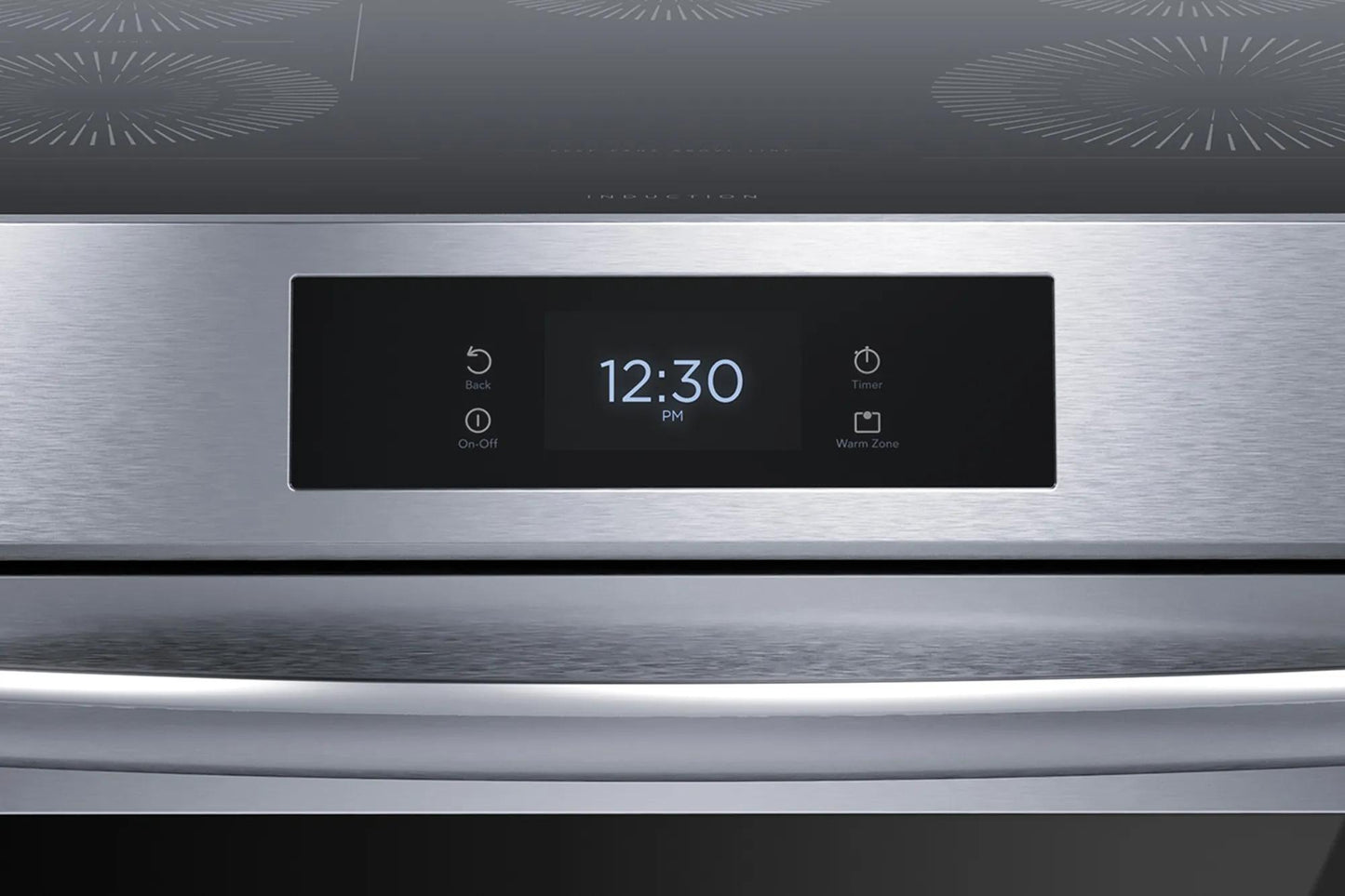 Close-up of stainless steel induction range digital control panel showing clock and touch controls from Ranges collection