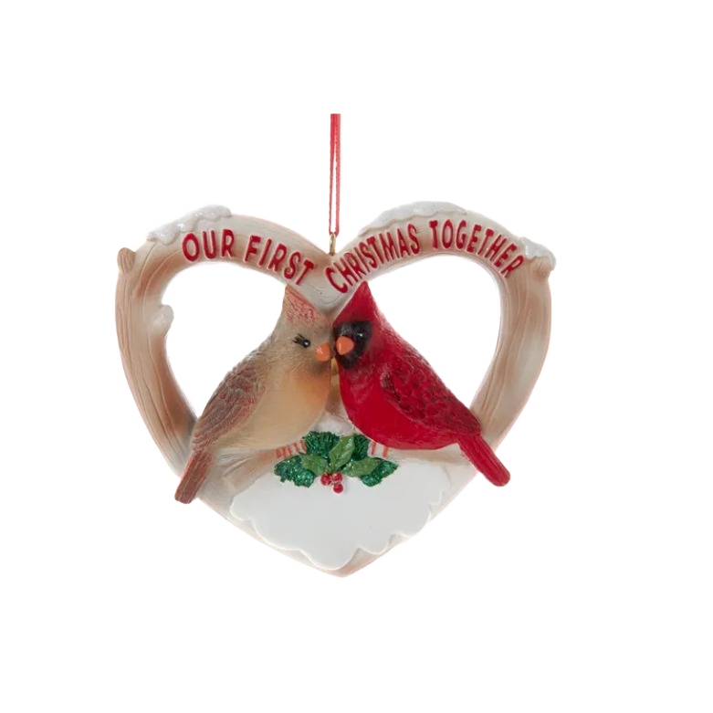 Heart-shaped Christmas ornament featuring two cardinals with "Our First Christmas Together" text for holiday decor collections