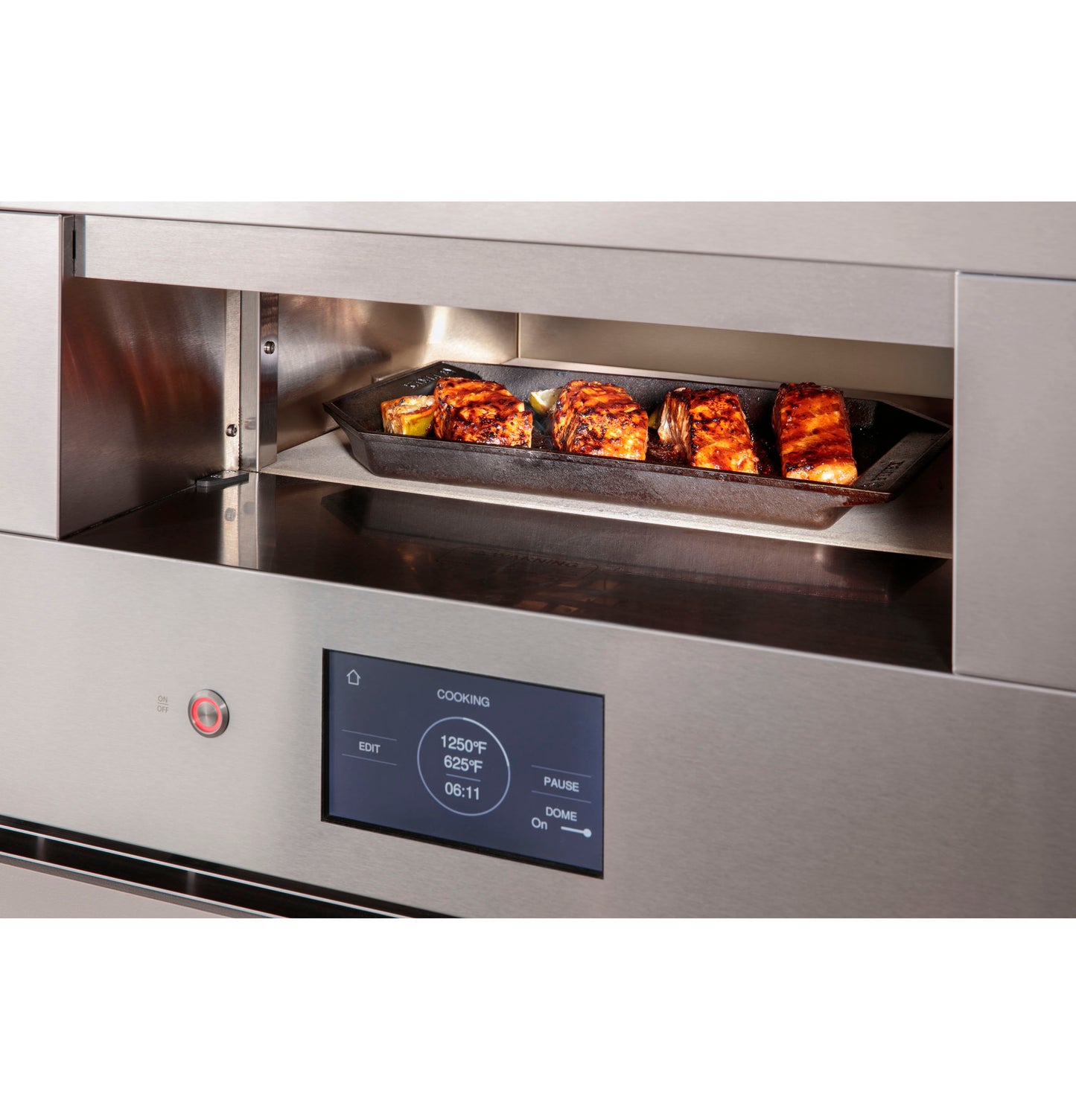 Stainless steel hearth oven with digital touchscreen cooking meat in a modern kitchen appliance setting