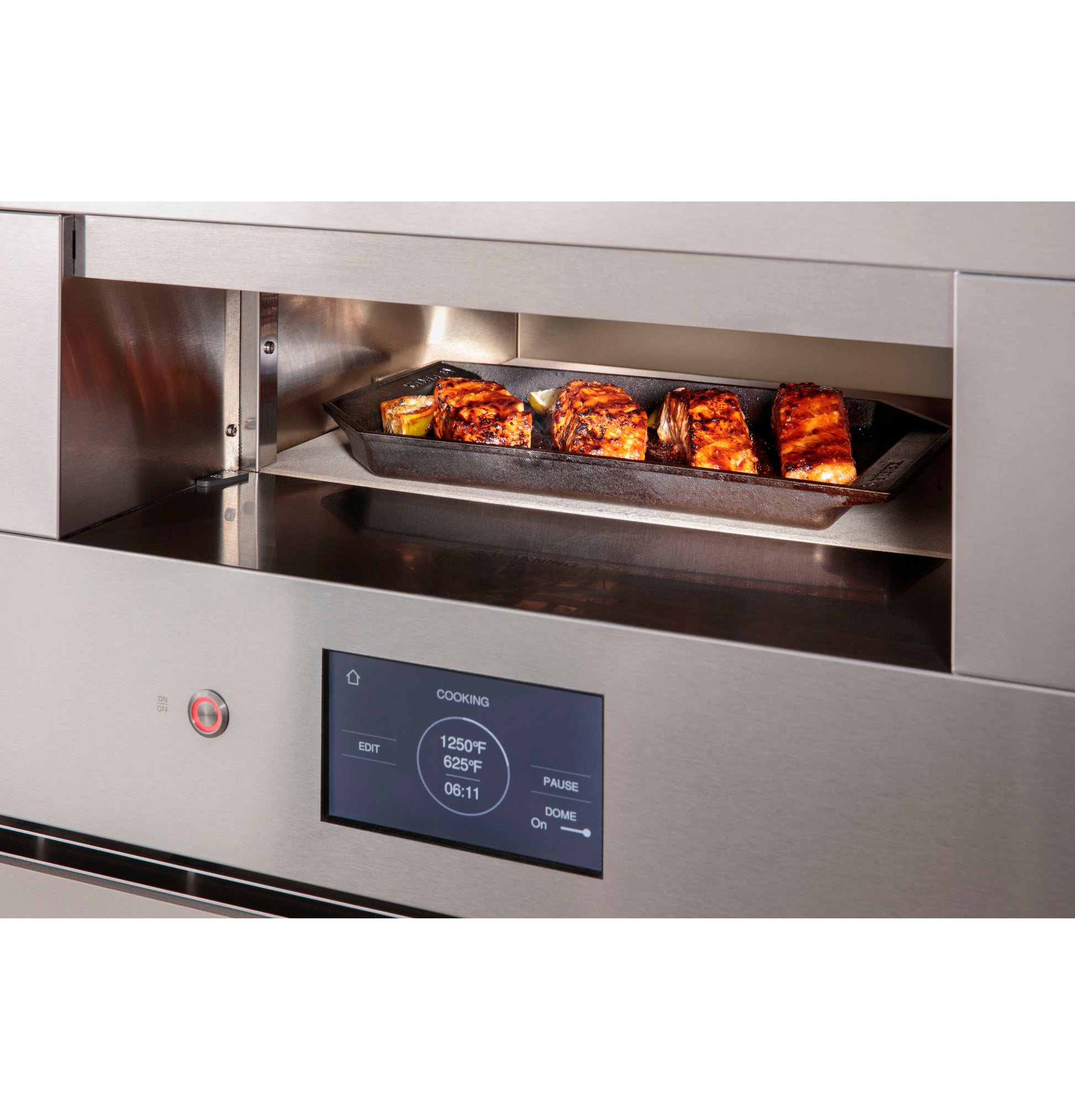 Stainless steel hearth oven with digital touchscreen cooking meat in a modern kitchen appliance setting