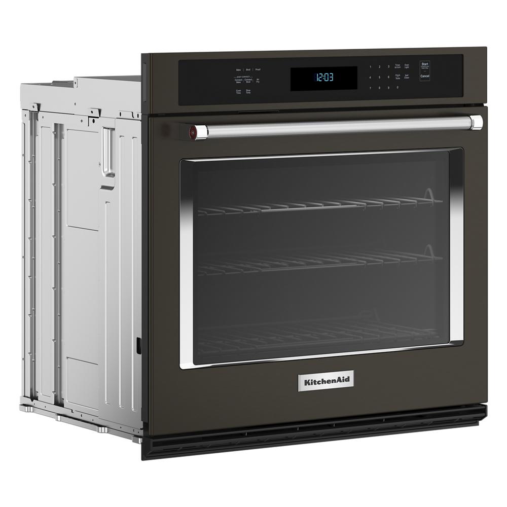 27-inch black single wall oven with digital display and stainless steel handle in KitchenAid appliances collection