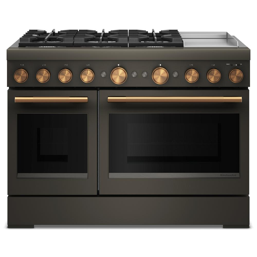 Front-facing view of matte black dual oven range with six burners and stainless steel electric griddle in kitchen setting