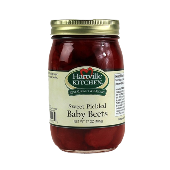 Glass jar of sweet pickled baby beets with gold metal lid from Hartville Kitchen preserved goods collection