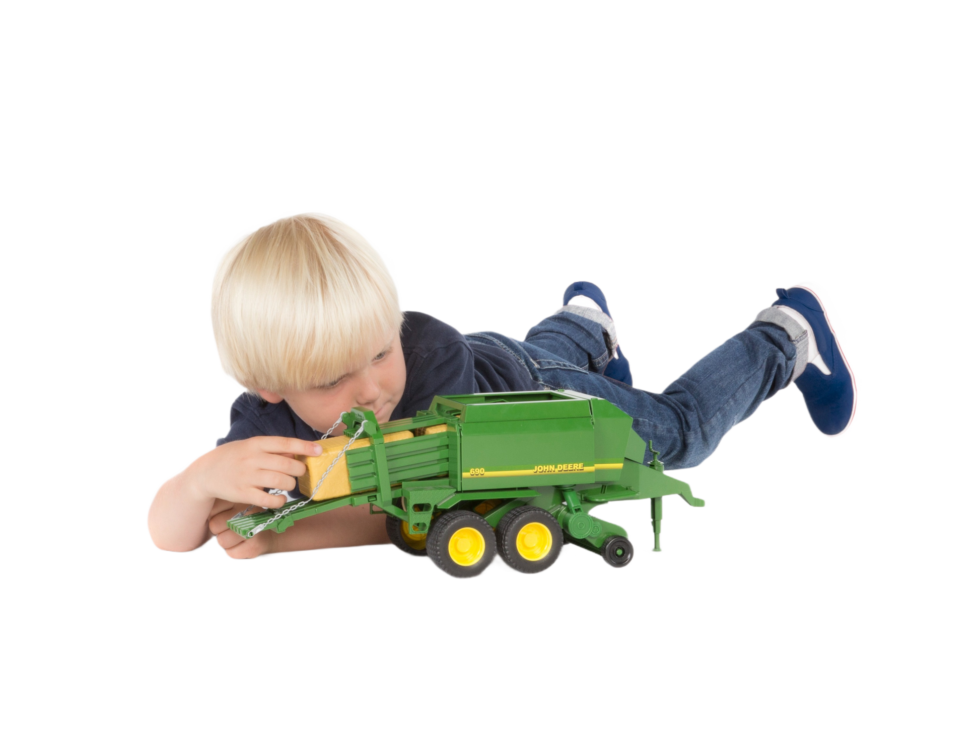 Child playing with green Bruder John Deere Big Bale Press toy in Vehicles & Remote Controlled Toys collection