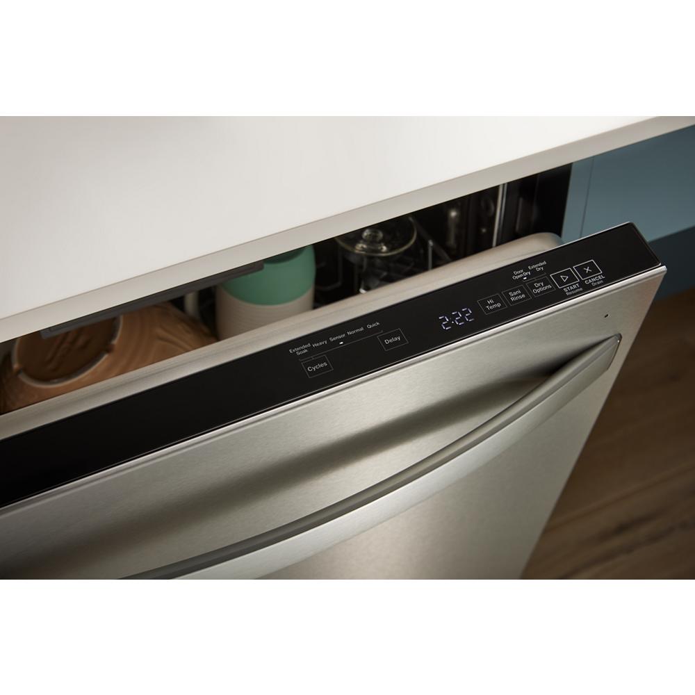 Close-up of stainless steel dishwasher control panel with digital display and touch controls in kitchen appliances collection