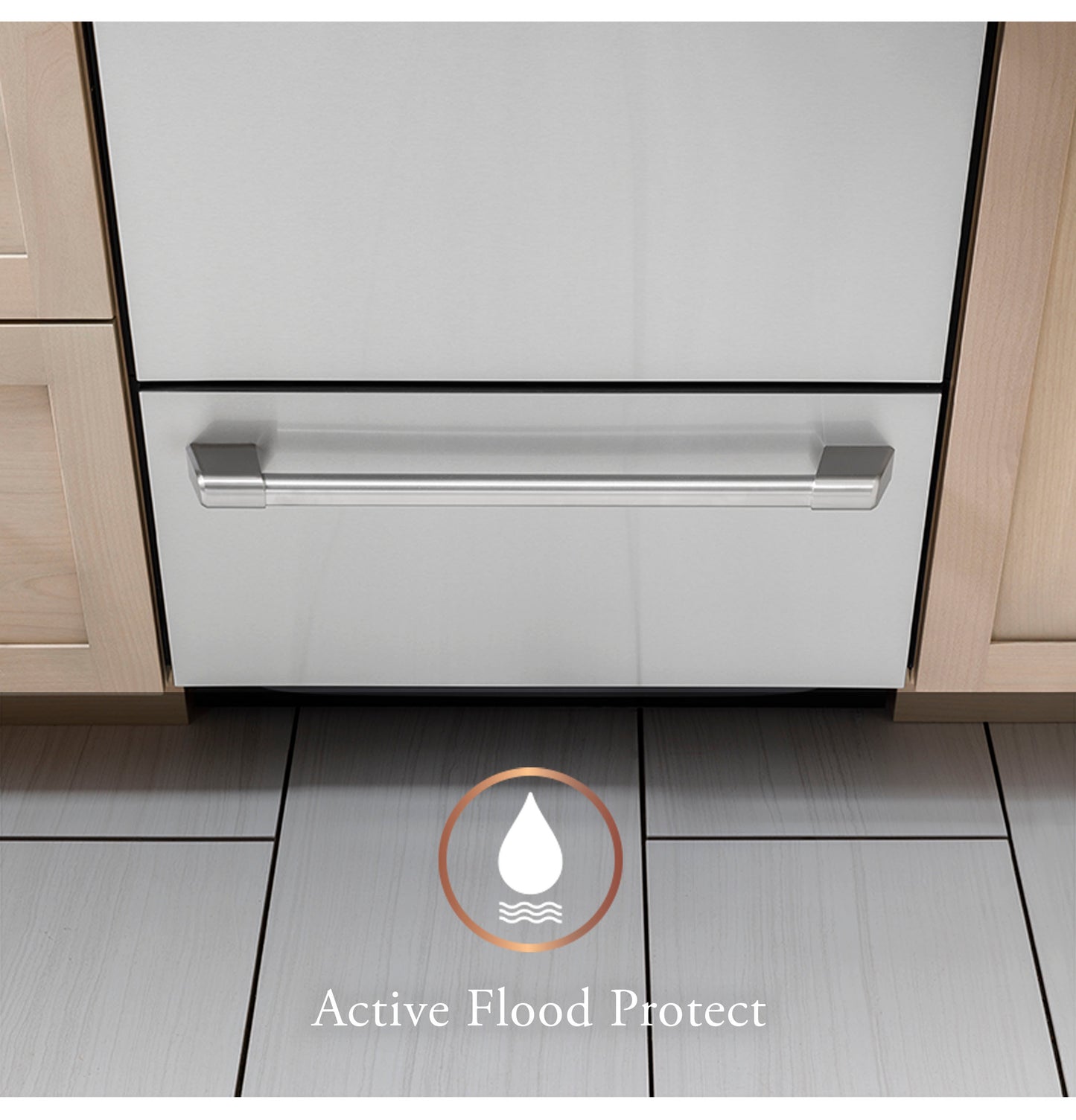 Lower drawer of stainless steel dishwasher with flood protection feature shown on tiled kitchen floor near wood cabinets