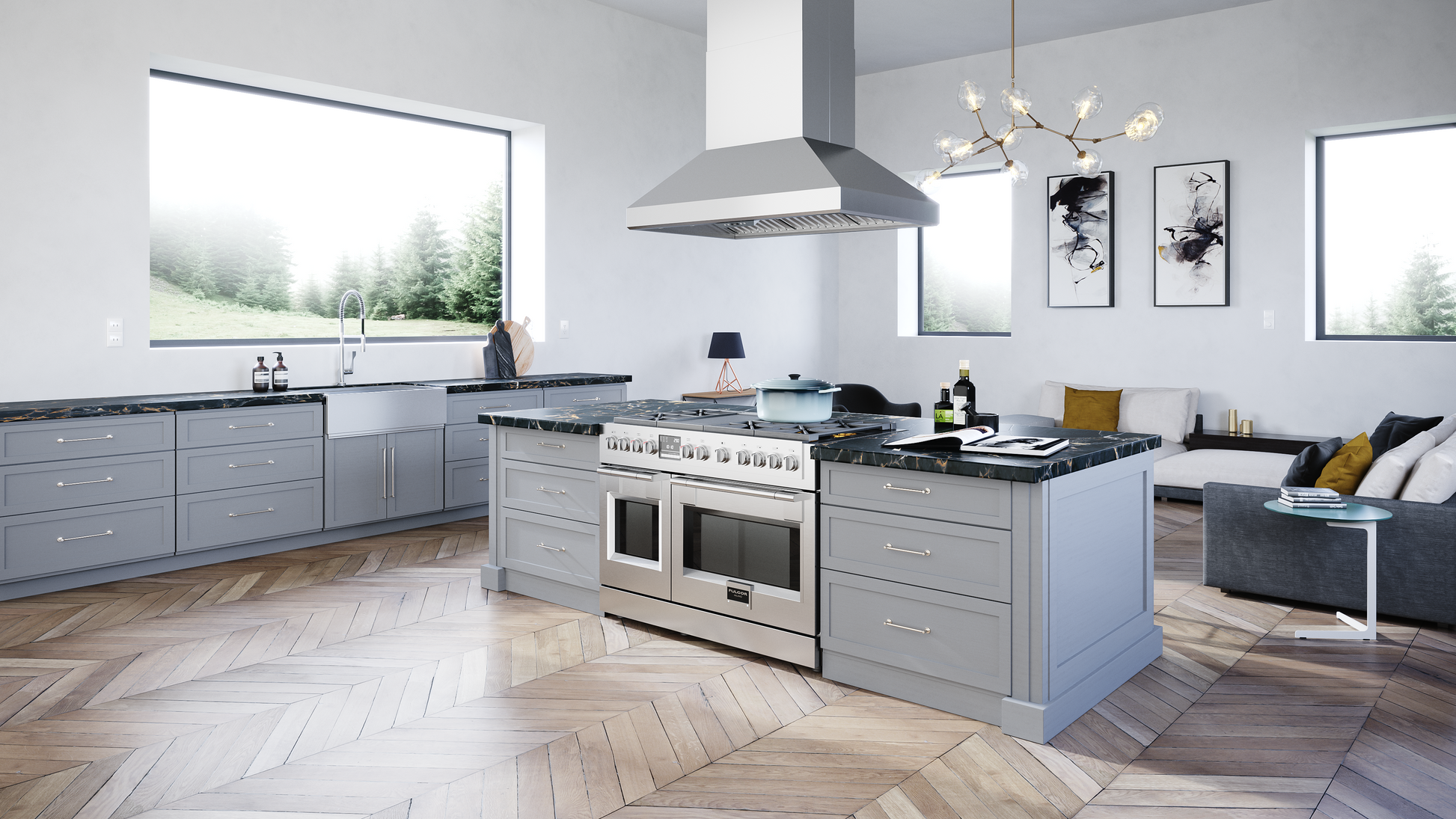 Stainless steel island range hood with modern angular design installed above a large professional-style cooktop in a spacious kitchen with light gray cabinetry and wood flooring, part of the Island Range Hoods and Kitchen & Kitchenware collections.
