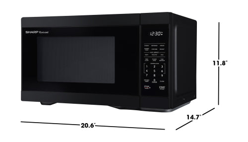 Black 1.1 CF countertop microwave oven with digital control panel in modern kitchen appliances collection