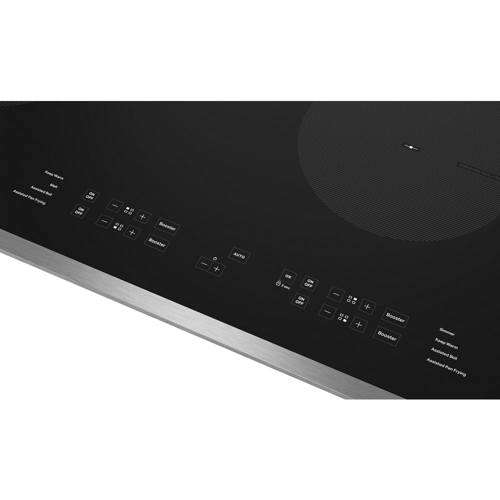 Black glass 30-inch induction cooktop with touch controls and stainless steel trim for modern kitchen appliances and cookware use