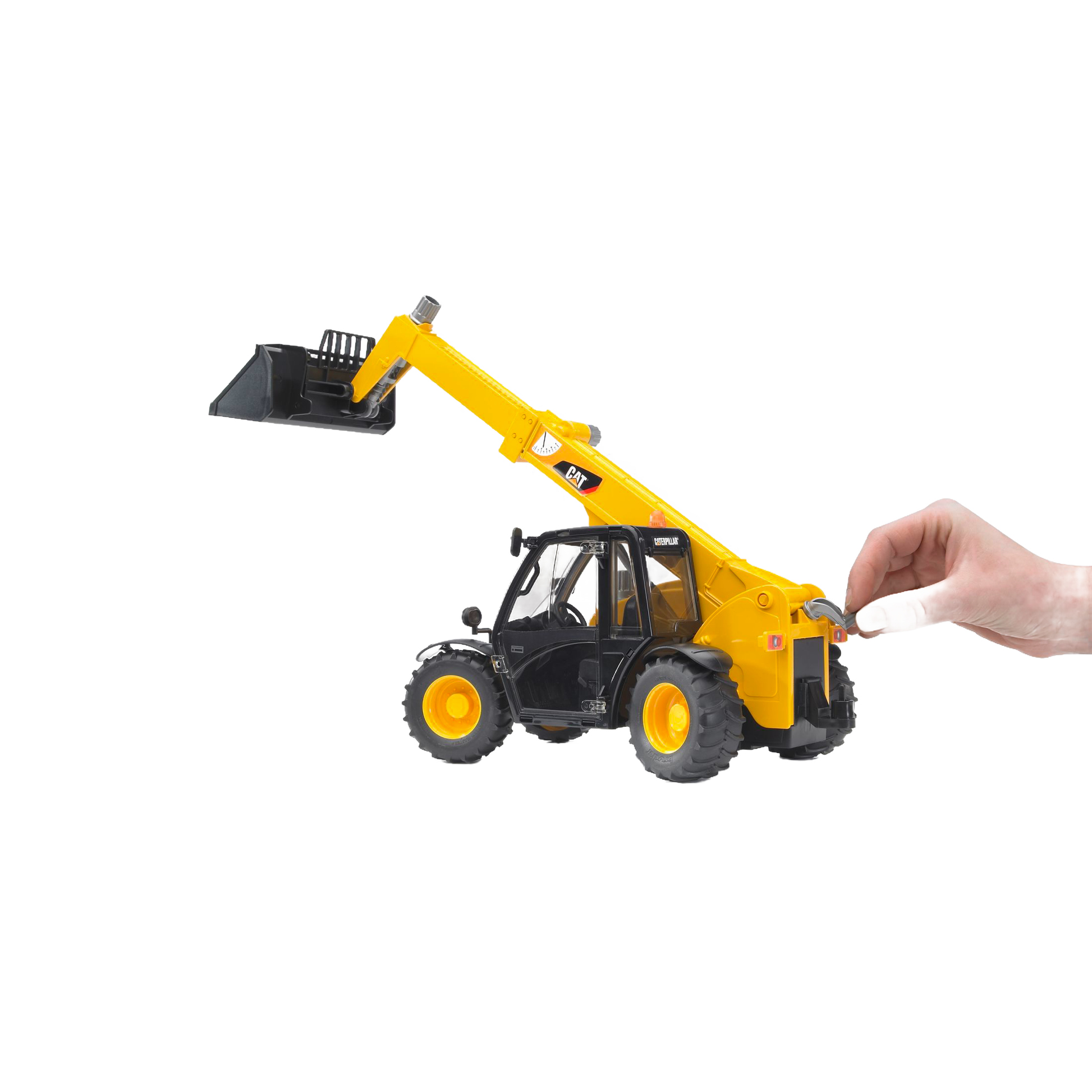 Hand operating yellow Bruder 02142 CAT Telehandler toy with extendable arm and front bucket in toy vehicles collection