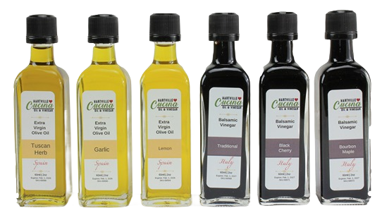Six 60mL bottles of infused olive oils and dark balsamic vinegars in oil and vinegar tasting sampler pack