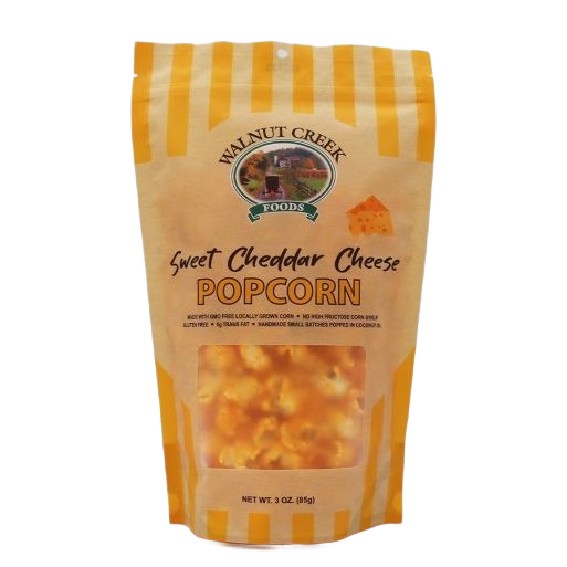 Resealable bag of Walnut Creek Foods sweet cheddar cheese popcorn from Chips & Snacks and Food & Beverage collections
