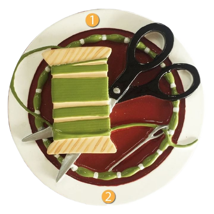 Sewing-themed Christmas ornament featuring scissors, spool of green thread, and needle for holiday decoration under $50 collection